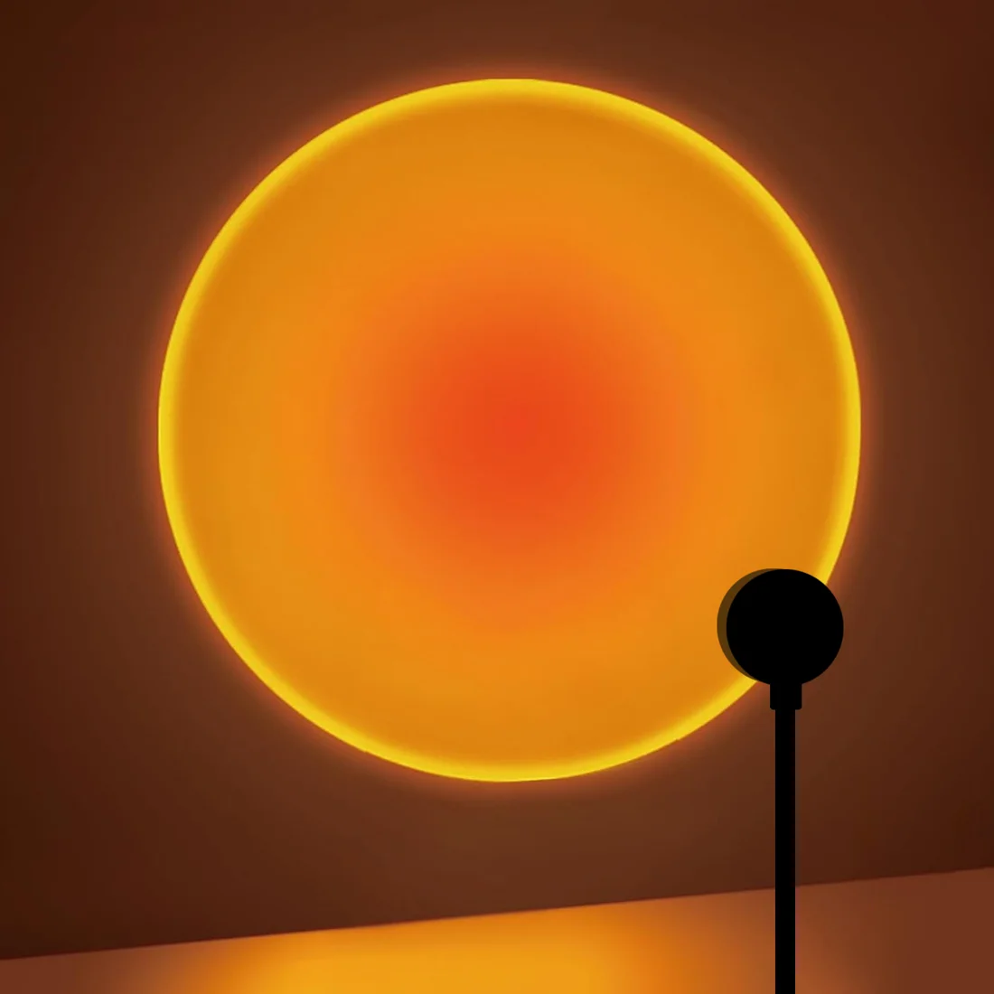 Lämmin auringonlaskuprojektio seinällä